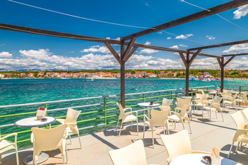Petrcane, picturesque seaside resort, view of the sea bay from  restaurant terrace, the Zadar County of Croatia, Europe.