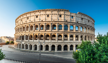 Fototapeta na wymiar Panorama Of Colosseum At Sunrise In Rome, Italy