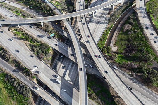 Aerial view of Interstate 5 and Route 118 freeway interchange bridges in the San Fernando Valley area of Los Angeles, California.