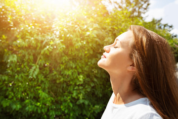 Young Woman Breathing Fresh Air
