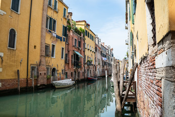 Fototapeta na wymiar Canal And Old Historic Houses In Venice