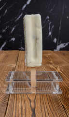 popsicle with green bean inside on a wood table