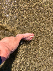 Man walking into the ocean