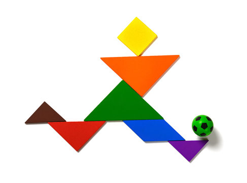 tangram shaped as a player  dribbling a soccer on white background