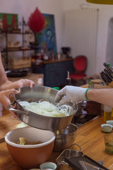 process of preparing onions caramelising in pan rustic decor homemade concept