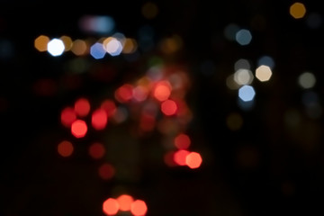 Bokeh, car lights on the night road