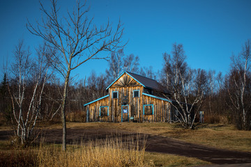 Fototapeta premium old wooden house in the forest