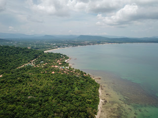 Aerial view of luxury resort with private villas and pools next the beach and ocean. Phu Quoc, Vietnam