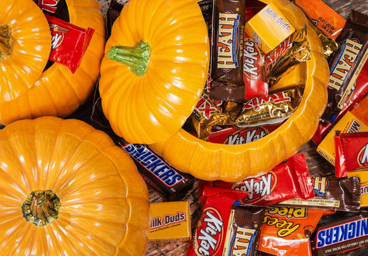 Decorative pumpkins filled with assorted Halloween chocolate candy made by Mars, Incorporated and the Hershey Company on October 31, 2014 in Dallas, Texas