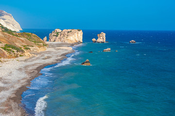 Fototapeta na wymiar Cyprus. Mediterranean sea. Rock Of Aphrodite. The Beach Of Aphrodite. Kuklia. Petra-Tu-Romiou. The legend of the birth of the goddess of love in Cyprus. Mediterranean vacation.