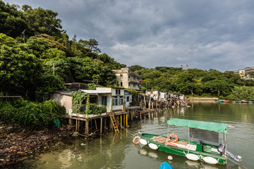 Fototapeta na wymiar The abandoned stilt houses in the evicted Ma Wan fishing village, Hong Kong