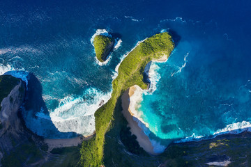 Aerial view at sea and rocks. Turquoise water background from top view. Summer seascape from air. Kelingking beach, Nusa Penida, Bali, Indonesia. Travel - image