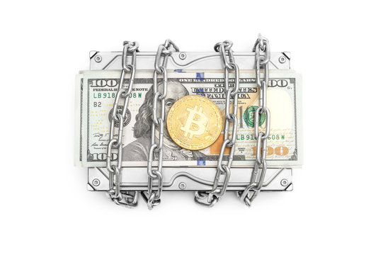 Coin of bitcoin with wrapped HDD by chain with padlock and dollar bills on white.