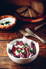Oven baked beet fries with greek yogurt and dill