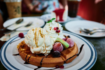 Vanilla ice cream and hot waffle