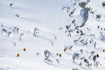 Alpine ski lift contrast  