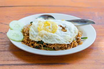 A plate of Indonesian fried noodles on the table, Bali, Indonesia