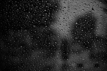 Obraz premium Rain water droplets on a windscreen