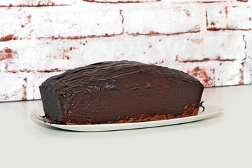 Sponge cake, pot cake or also called box cake with chocolate sauce