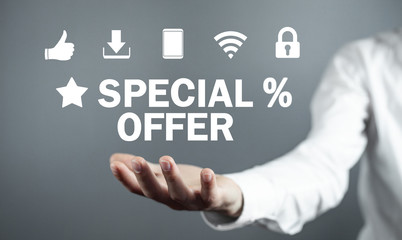 Businessman holding Special Offer text. Business concept