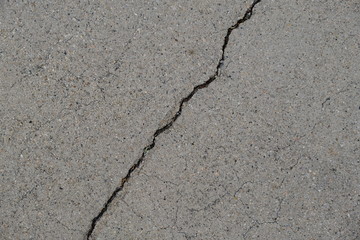 Obraz premium Crack on a concrete surface in Los Angeles for interior design.