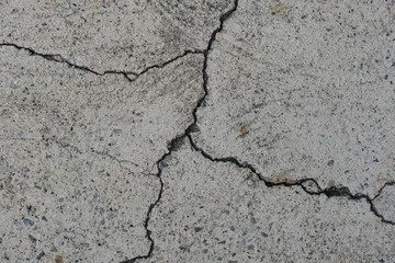 Fototapeta premium Crack on a concrete surface in Los Angeles for interior design.