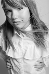 Fashionable teenager girl. Black and white photo. 