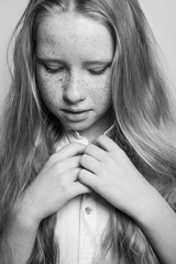 Girl teenager portrait. Black and white photo.