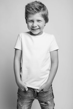 Fashionable little boy. Black and white photo. 