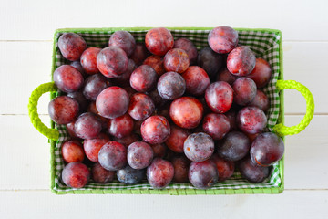 Natural red mirabelle plums from the garden