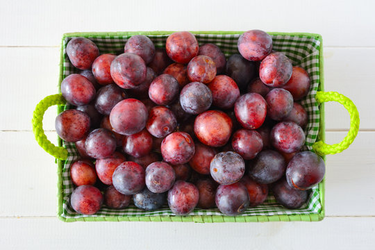 Natural red mirabelle plums from the garden
