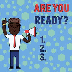 Word writing text Are You Ready Question. Business photo showcasing used telling someone start something when feel prepared Man Standing with Raised Right Index Finger and Speaking into Megaphone