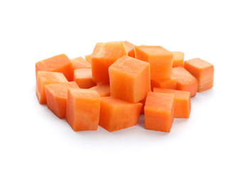 Pile of fresh carrot cubes isolated on white