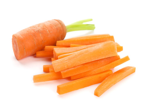 Tasty ripe cut carrot on white background