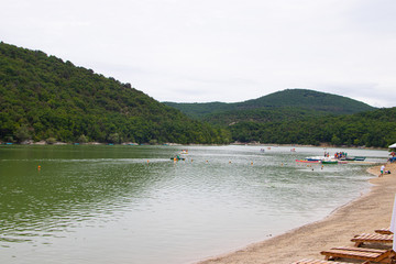 Cypress Lake in Succo. Attractions Anapa. Green lake. Lake with clear water. . The nature of Russia. Trees grow in the water.