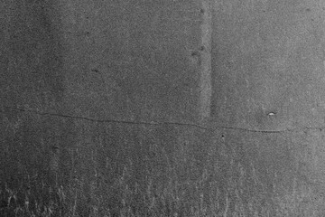 Texture of a concrete wall with cracks and scratches which can be used as a background