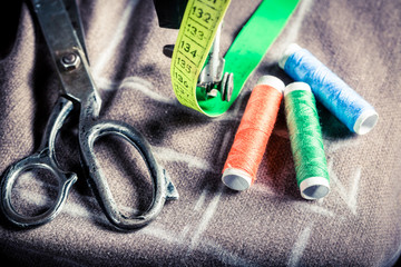 Top view of sewing machine with needle and threads