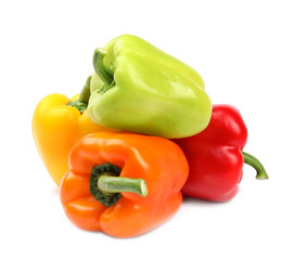 Fresh ripe bell peppers on white background