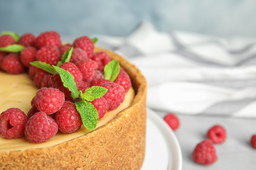 Delicious raspberry cake on table, closeup. Space for text