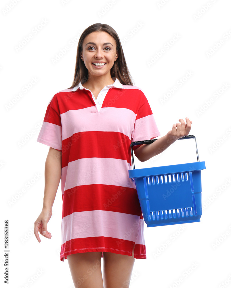 Poster Young woman with empty shopping basket isolated on white