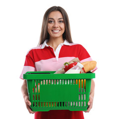 Fototapeta na wymiar Young woman with shopping basket isolated on white