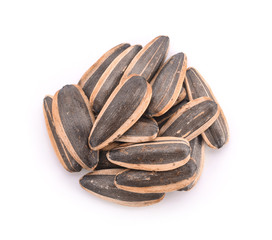 Healthy sun-flower seeds on a white background