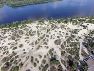 Aerial drone view of Kiev cityscape, Dnepr river.