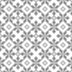 Cross-stitch, embroidery. Black and white seamless decorative pattern. Ornamented background for wallpaper, textile.