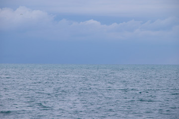 Obraz premium Sea in cloudy weather. Calm sea. View of the sea from a height. Anapa district. The vastness of Russia. Black Sea . Summer landscape sea and sky