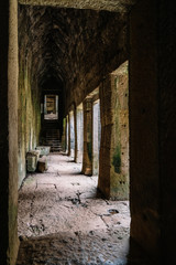 Corridor in the ruins of the Ankgor Thom Buddhist temples in Cambodia - Unesco World Heritage Site 1992