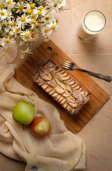 Homemade natural apple pie with glass of milk