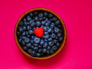Gifts of the summer garden, raspberries and blueberries. Vitamins and summer