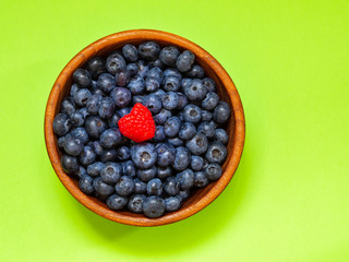 Gifts of the summer garden, raspberries and blueberries. Vitamins and summer