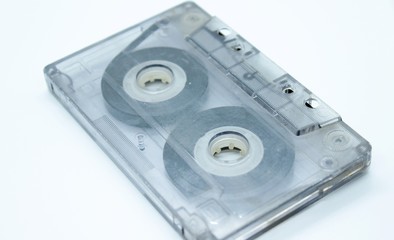 Fototapeta premium Old audio cassette located on a white background